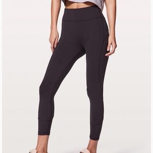 Lululemon long leggings with zipper at ankle.